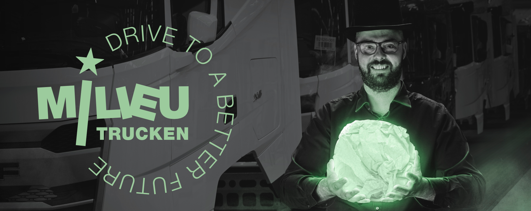 Man met groene bol voor milieuvriendelijke truck